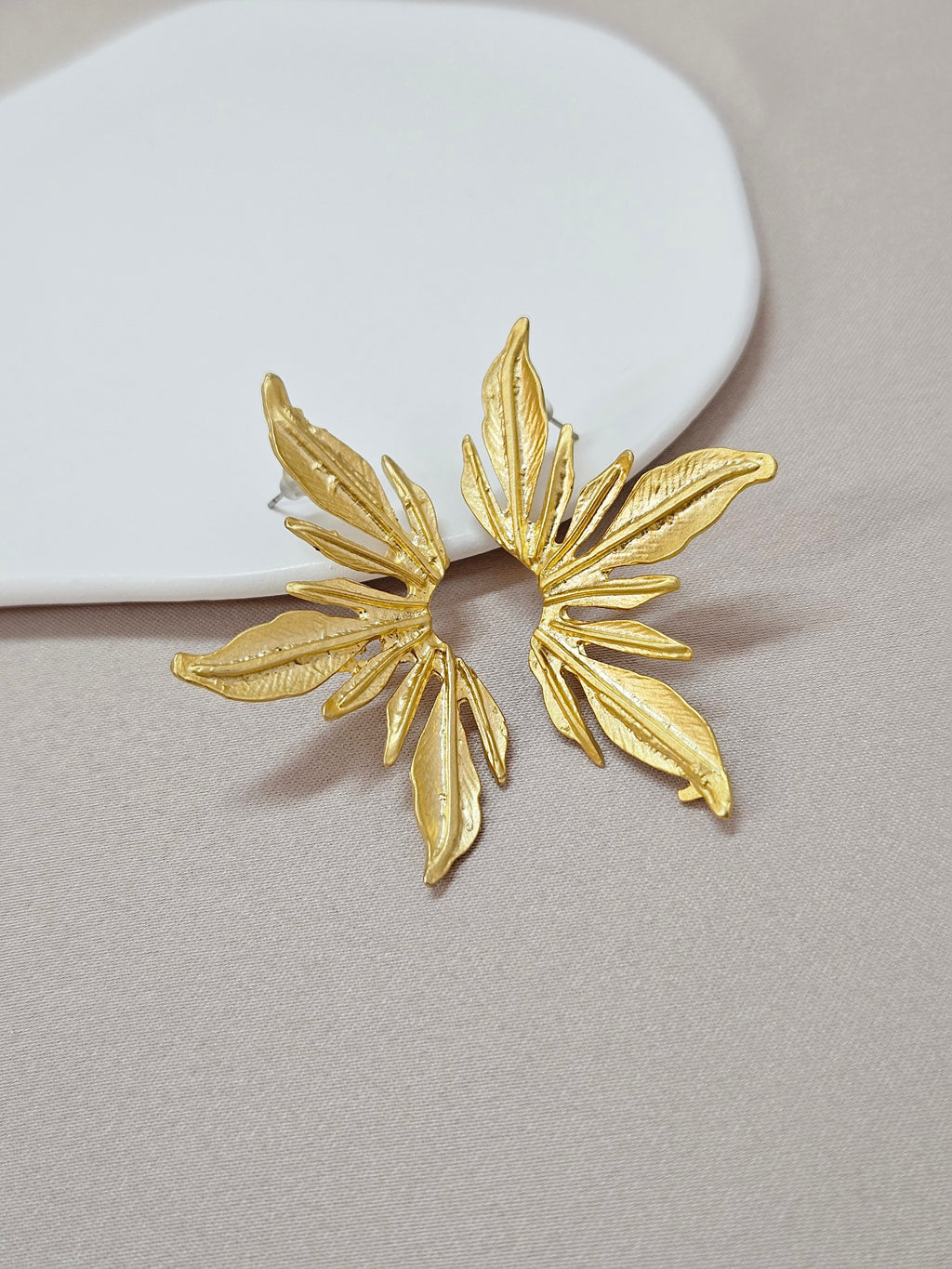 big statement gold leaf earrings
