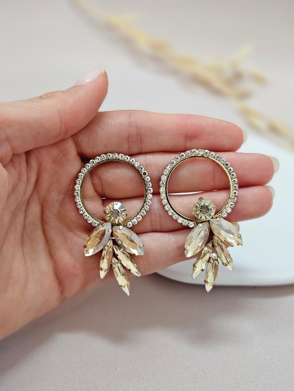 big circle stud earrings with champagne crystal leaf shape