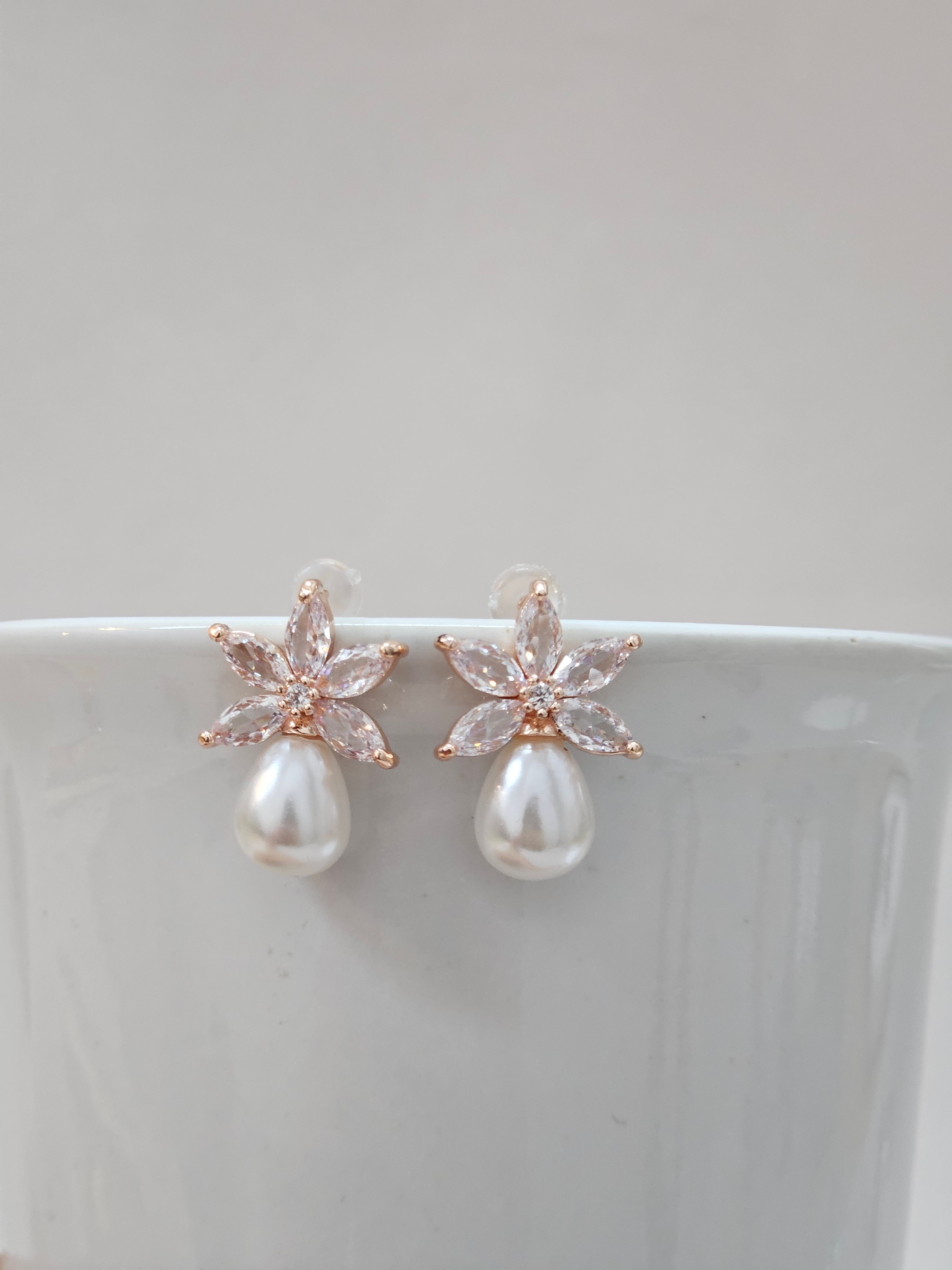 delicate floral rose gold pearl stud earrings 