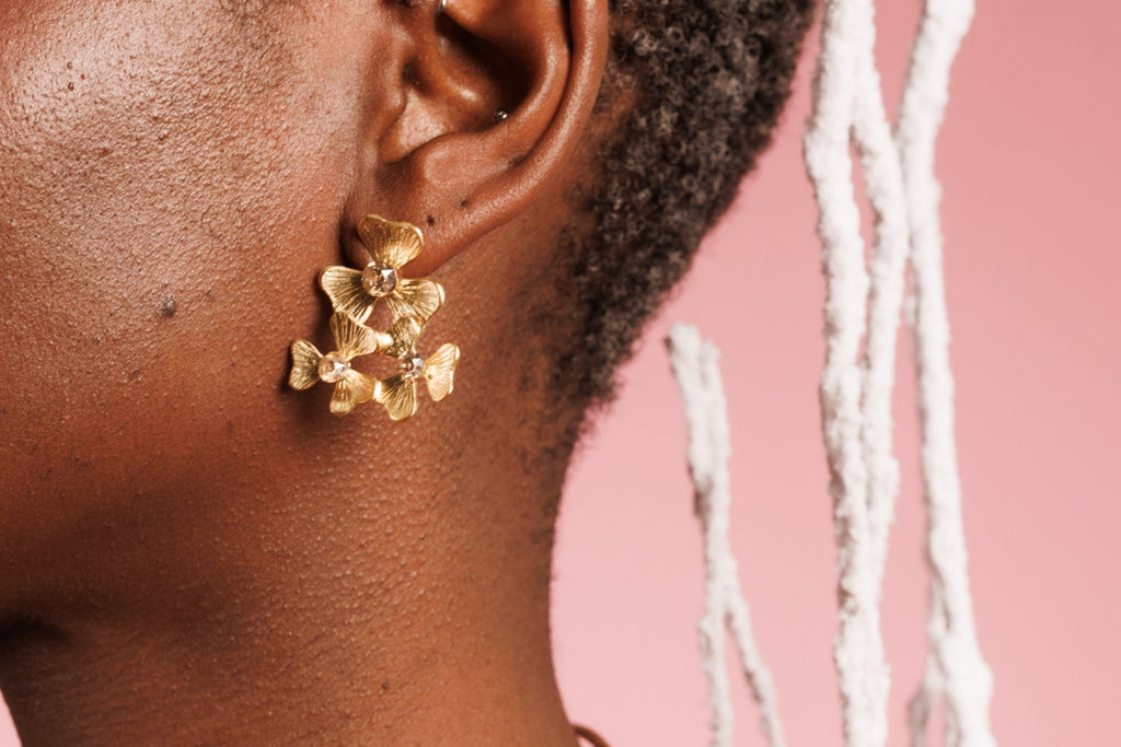 gold plated three flowers with champagne crystals statement earrings
