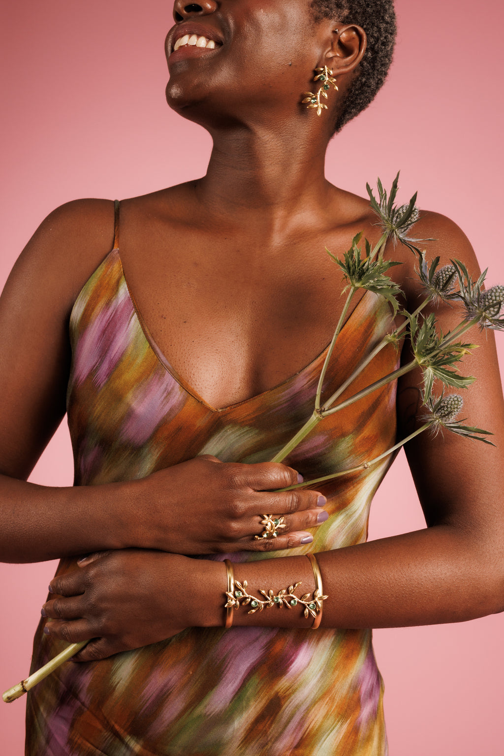 Gold Leaf Earrings with a matching vertical leaf bracelet and open adjustable gold leaf ring 