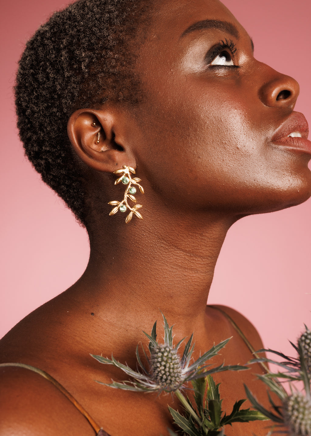 gold leaf dangle earrings with customizble green crystal crystals
