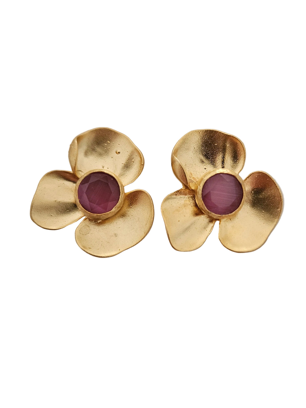 statement gold earrings with a pink stone in the middle 