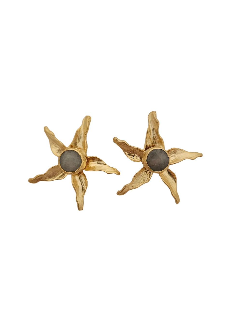handmade gold starfish earrings combined with gray stone in the middle

