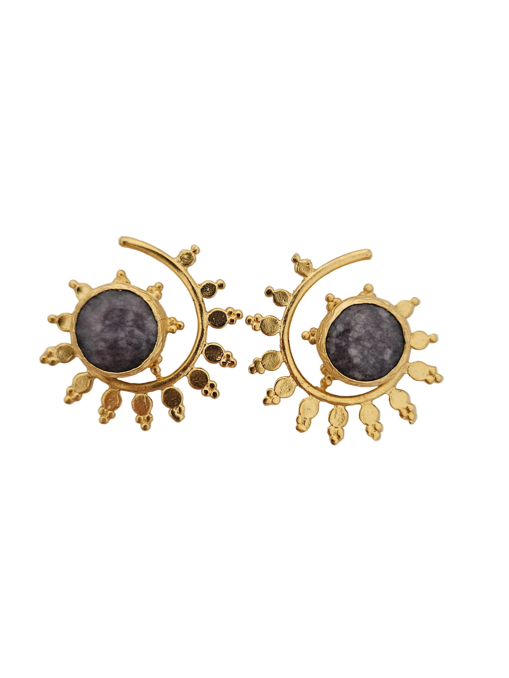 A pair of gold crescent moon and sun earrings with oval purple stones in the center